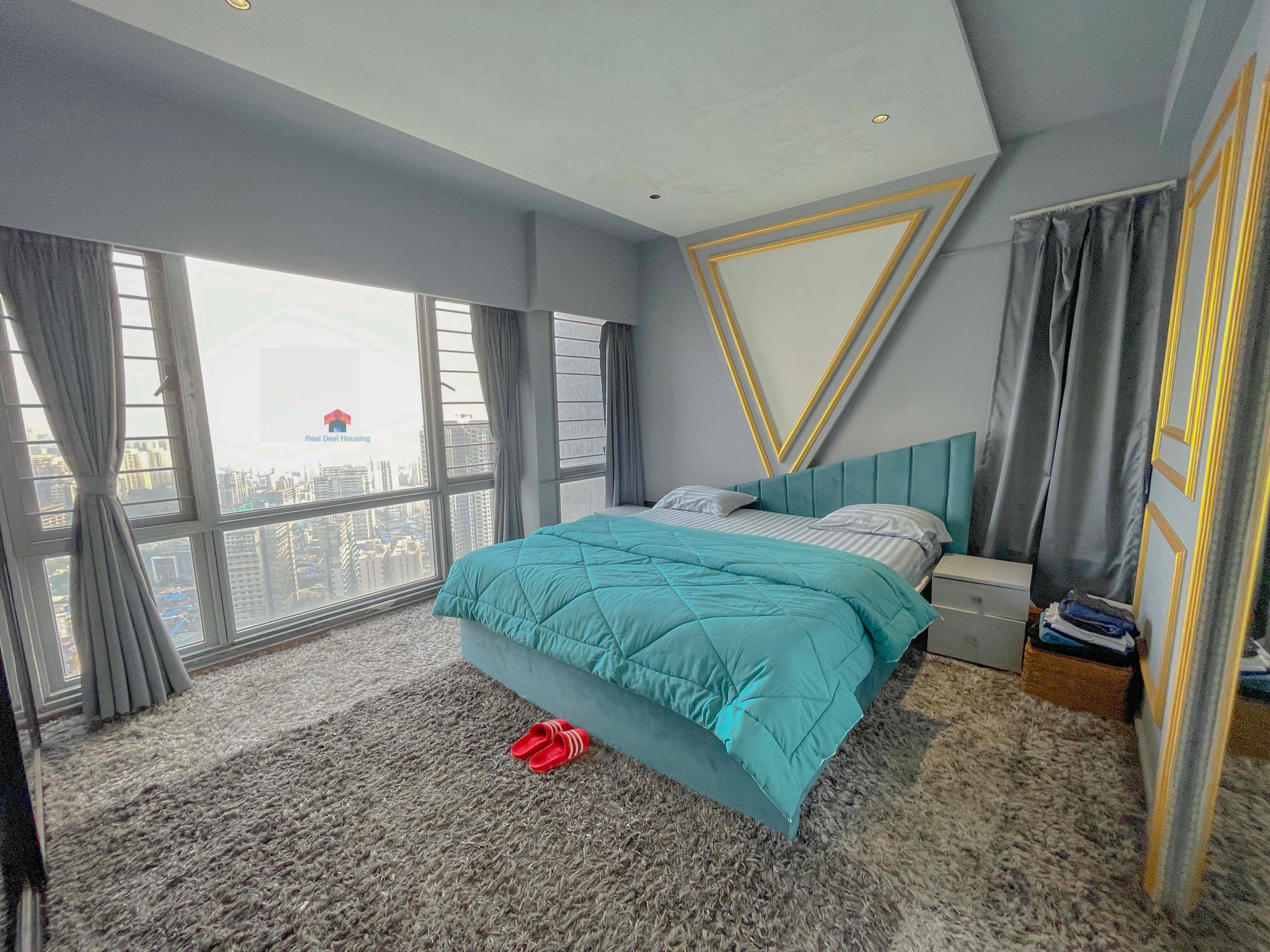Living room of a high-floor 3.5 BHK in Imperial Heights